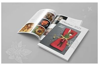 This year's Christmas brochure from Thomas Ridley Foodservice open on a table